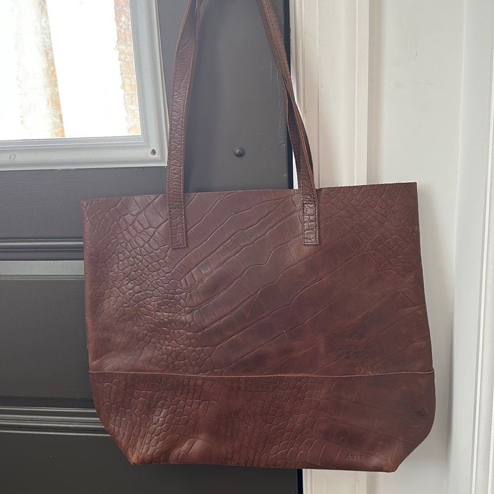 ABLE chocolate brown crocodile print genuine leather tote.